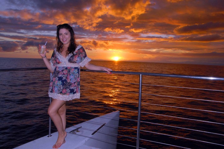 Woman on sunset cruise